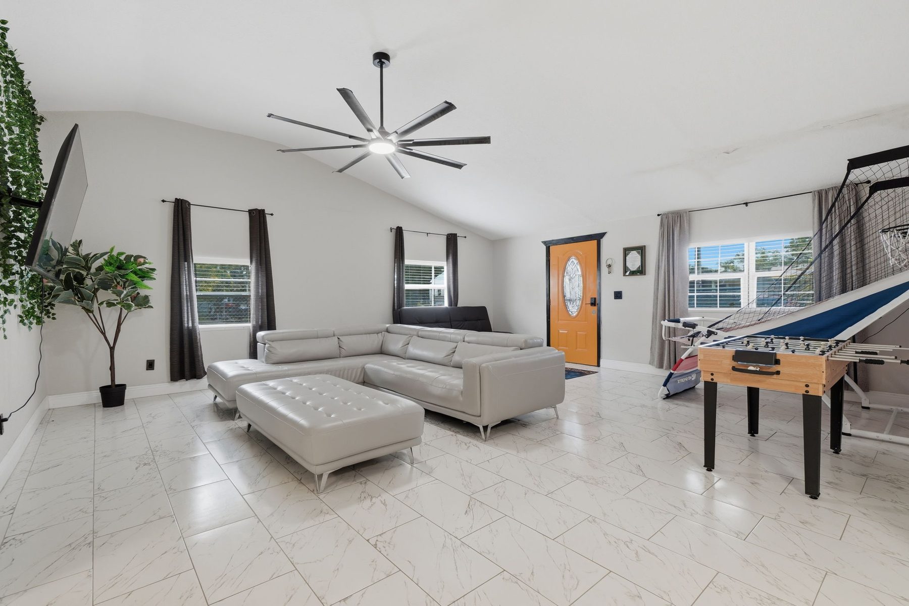 A spacious furnished living area in a Libema Orlando home