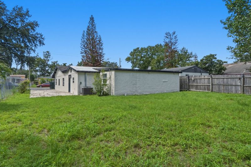 Fenced backyard and side parking
