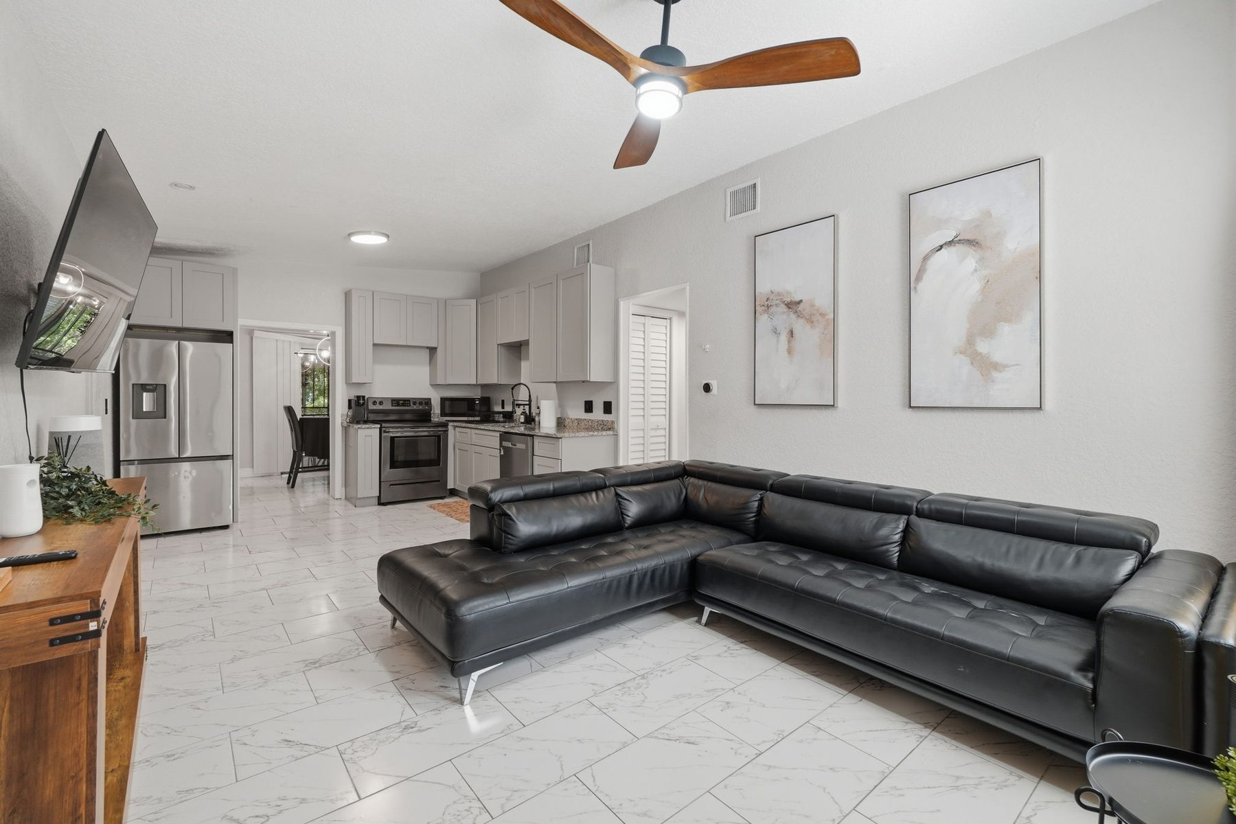 Open living and kitchen in a furnished Libema home