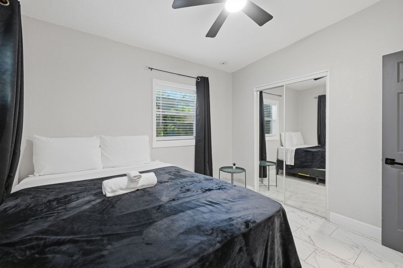 Second bedroom with mirrored closet