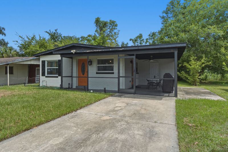 Front of the house and concrete driveway