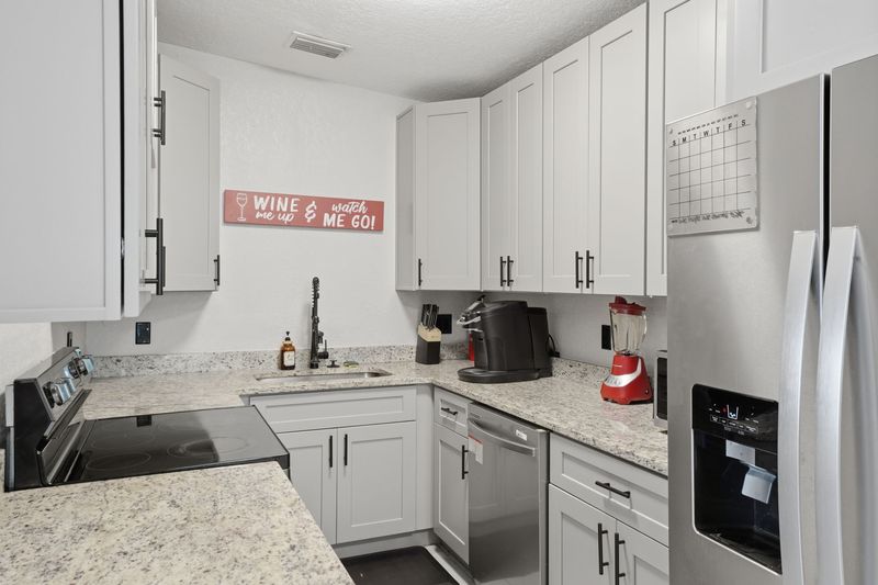 Renovated kitchen with stainless appliances